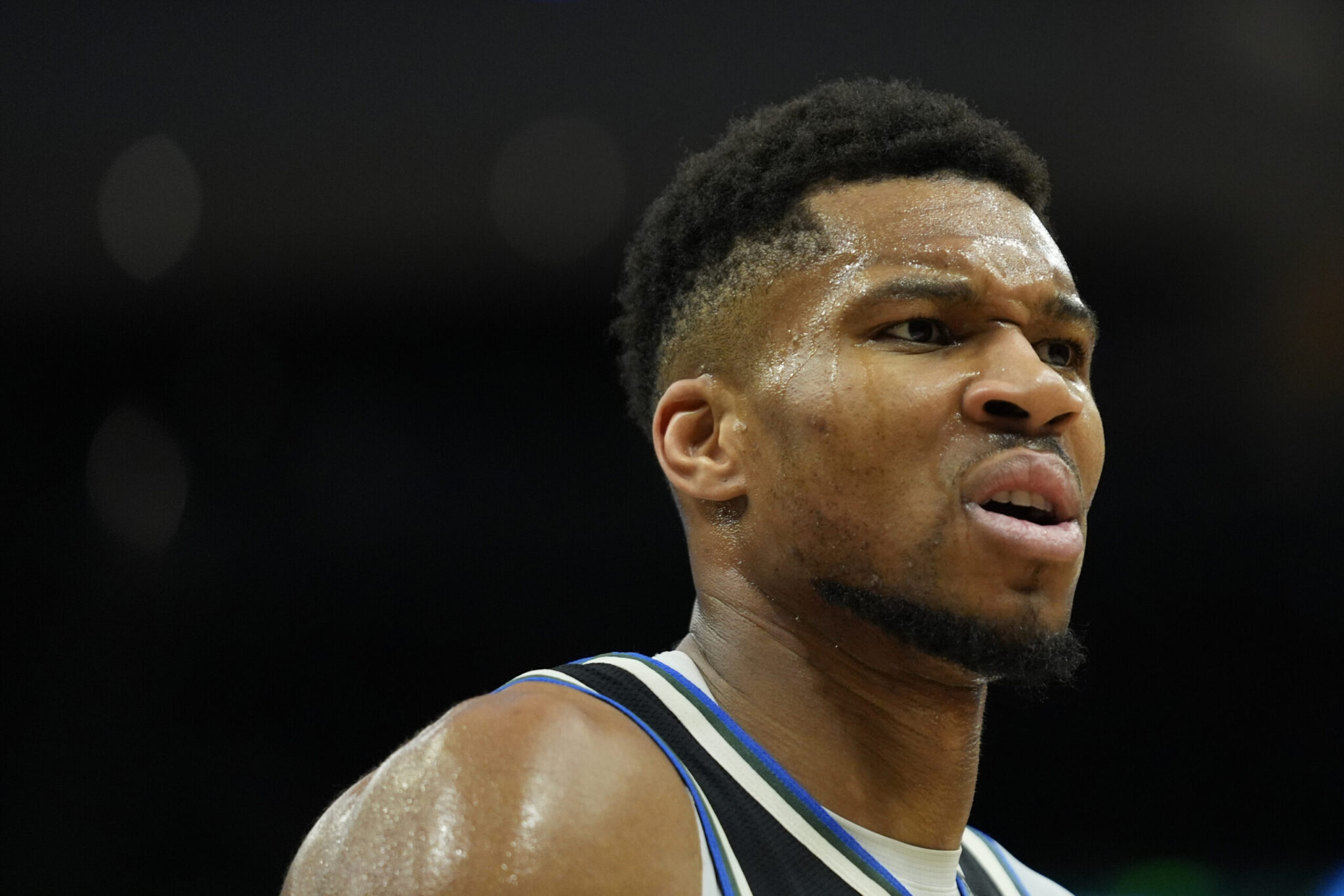 Bucks fans leave mementos at a mural of Antetokounmpo, and he responds: “Guys, I’m not dead.”