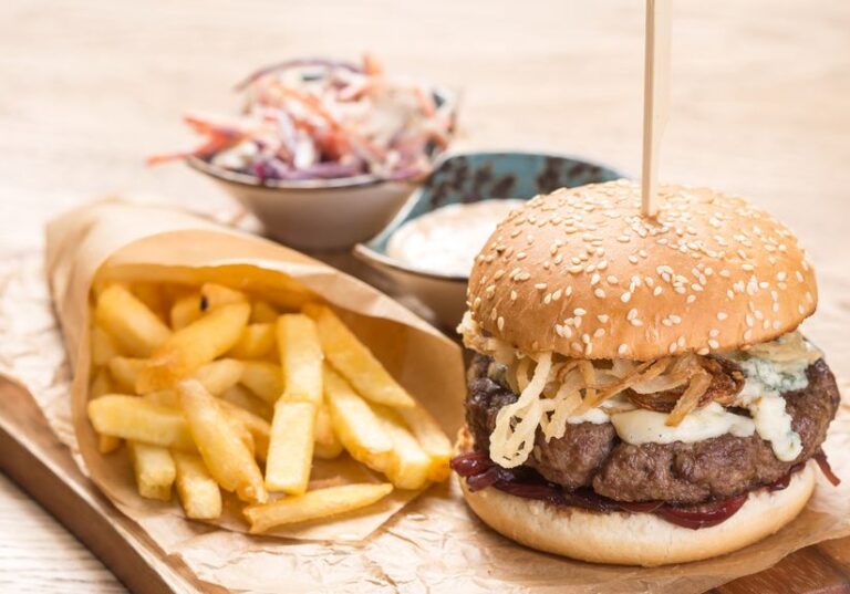 Beef burger with ground beef, caramelized onions, and BBQ sauce