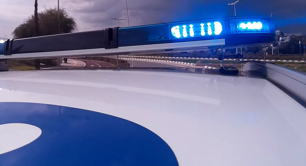 Traffic chaos on the highway following a car accident; one lane is closed