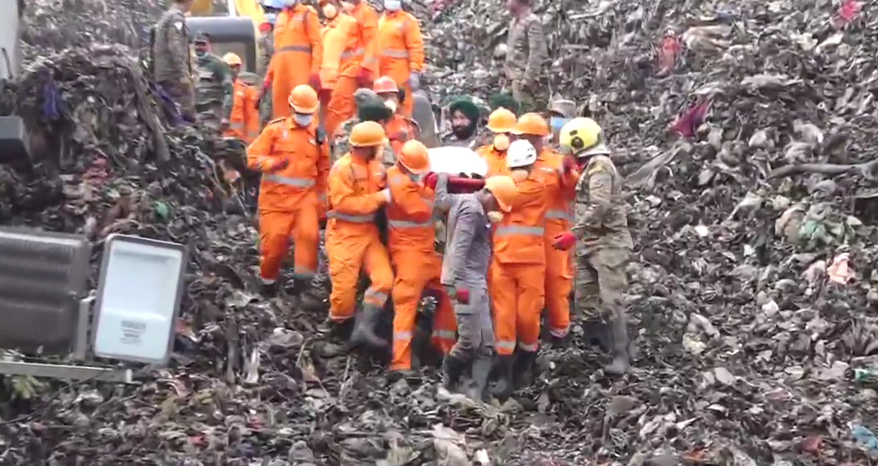 VIDEO: A "mountain" of trash collapsed onto people in India, killing at least nine