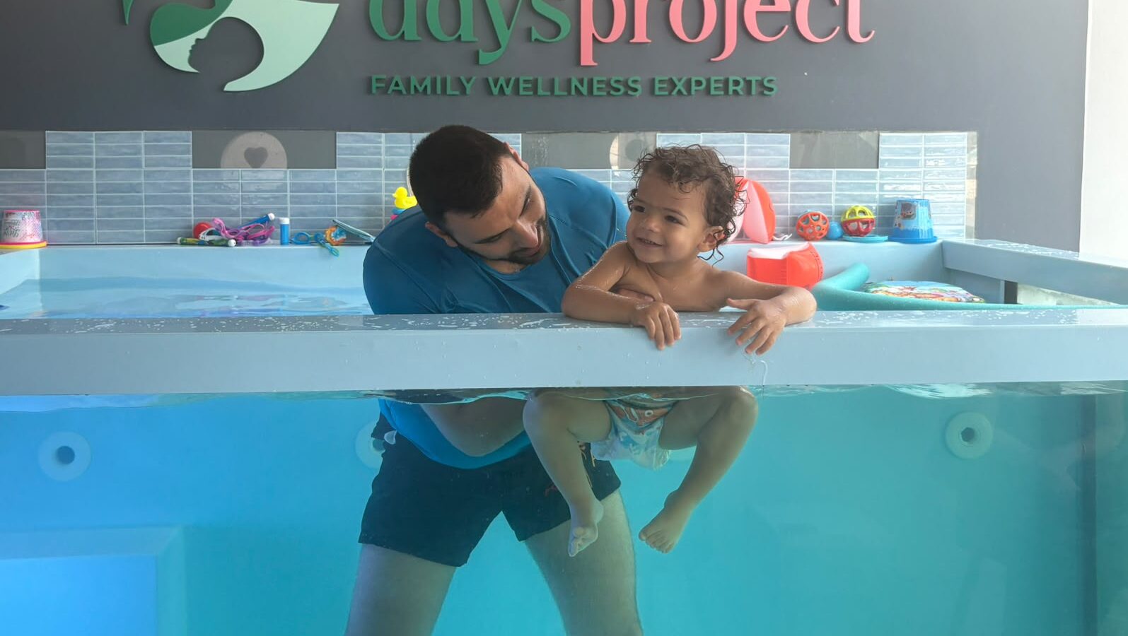 From an early age… into the deep end! Tiny swimmers discover the magic of water