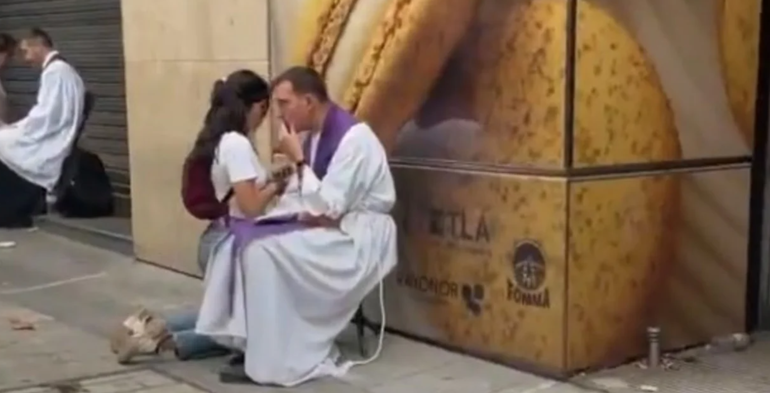 Unbelievable scenes in Paris: Dozens of clergymen hearing confessions from the faithful on the streets of the Champs-Élysées
