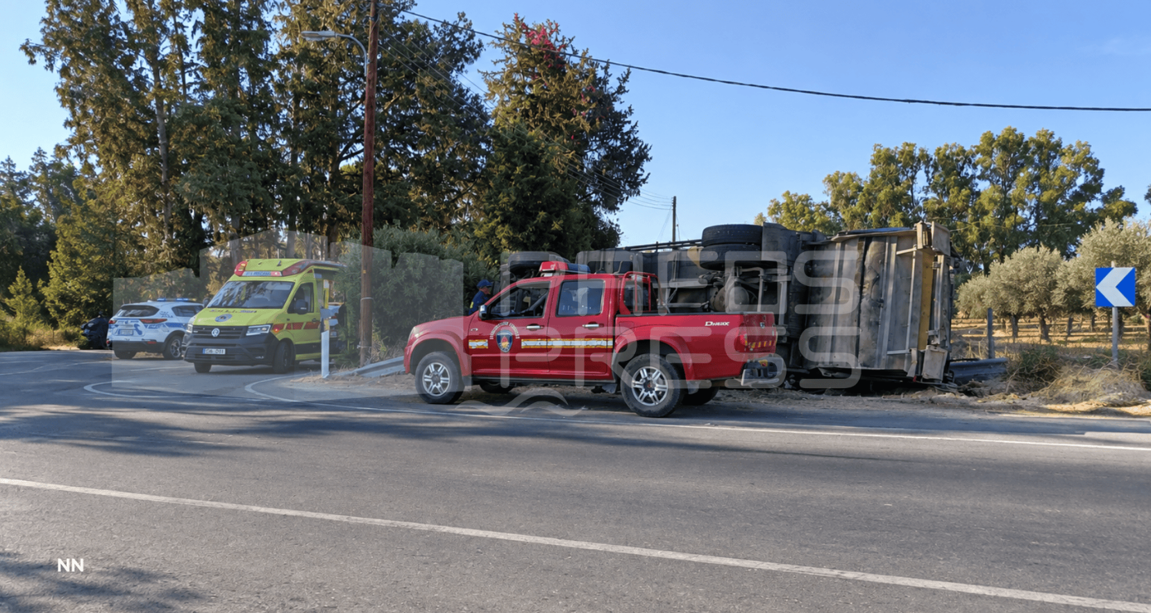 A garbage truck crashed into an EAC utility pole and overturned in Paphos; reports indicate brake failure
