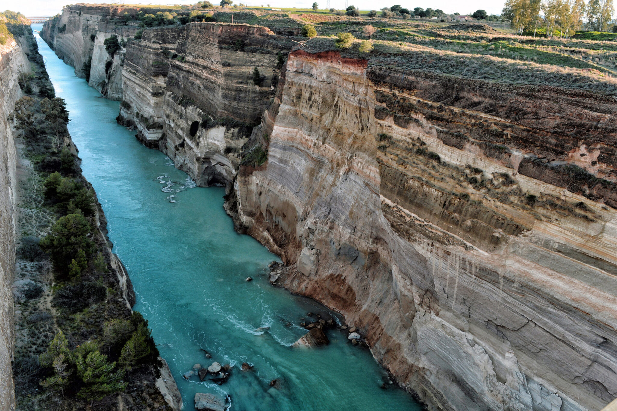 A woman was found dead in the Corinth Canal; she was recovered by a boat
