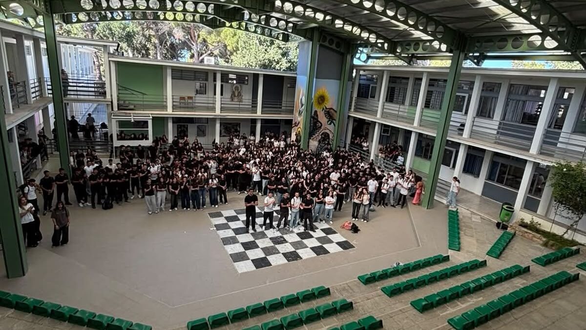 VIDEO & PHOTOS: High school and middle school students walk out of class to protest over air conditioning and textbooks