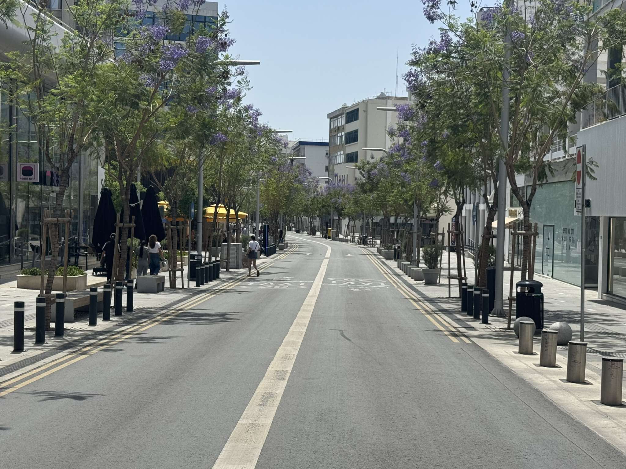 Who wants to reopen Makariou Street, and why?