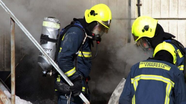 A vehicle in a covered parking garage at a shopping center in Nicosia was engulfed in flames