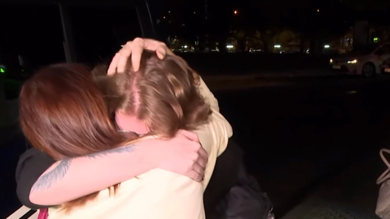 Touching video: The moment a young survivor in Spain “broke down” in his family’s arms